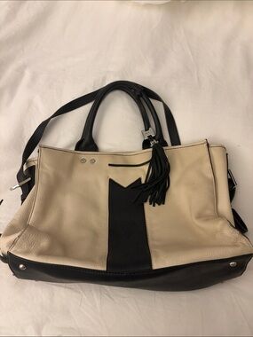 Aimee Kestenberg Two-Tone Cream and Black Leather Tote with Tassel